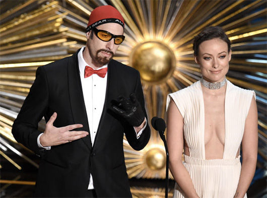 Sacha Baron Cohen and Olivia Wilde at the Oscars