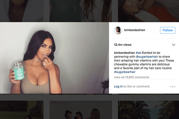 Screenshot of a sponsored Kim Kardashian post on Instagram.