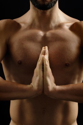 Memet Takes It All off for Nude Yoga