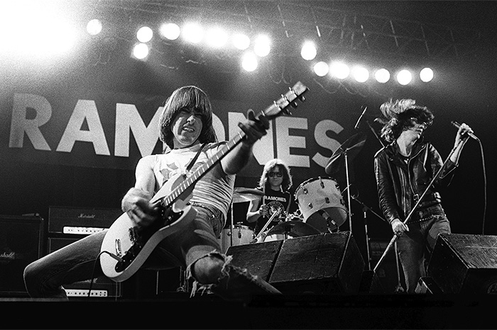 Johnny, Tommy, and Joey Ramone performing in 1977.