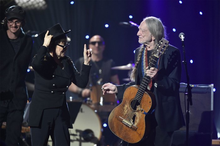 Yoko Ono and Willie Nelson perform on stage during the Imagine: John Lennon 75th Birthday Concert at Madison Square Garden on Dec. 5, 2015