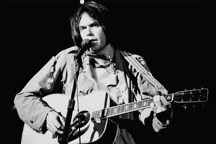 Neil Young performs at Winterland Arena in San Francisco on Nov. 25, 1976