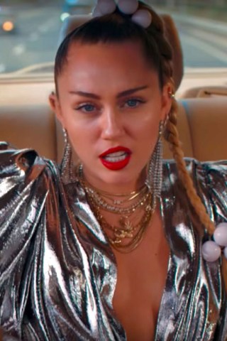 See Miley Cyrus Dodging Cops, Bullets, & Strippers